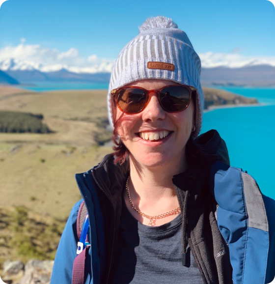 me in a beanie hiking in New Zealand